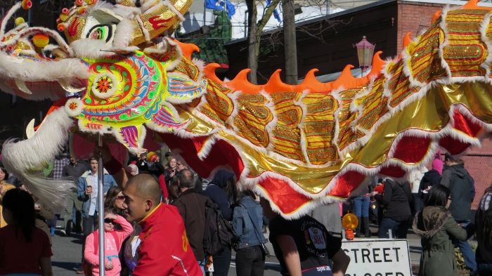 Dragon Dancers parade through the International District in Seattle.